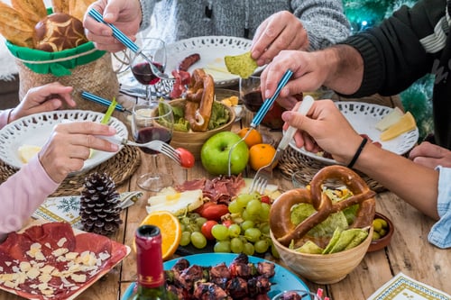 Preview: Family group people enjoy lunch together in christmas days season