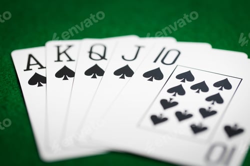 Preview: poker hand of playing cards on green casino cloth