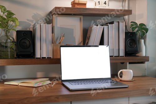 Preview: Open laptop with blank screen on a wooden desk in a kitchen room home office