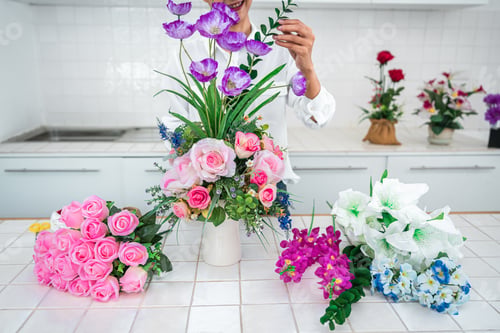 Preview: Young woman florist work making organizing diy artificial flower, craft and hand made concept