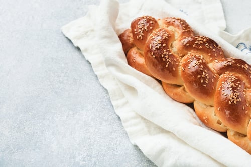 Preview: Sabbath kiddush ceremony composition. Challah bread. Freshly baked homemade braided challah bread fo