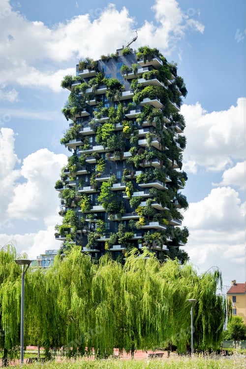 Preview: View of a Milan Vertical Forest apartment tower against blue sky