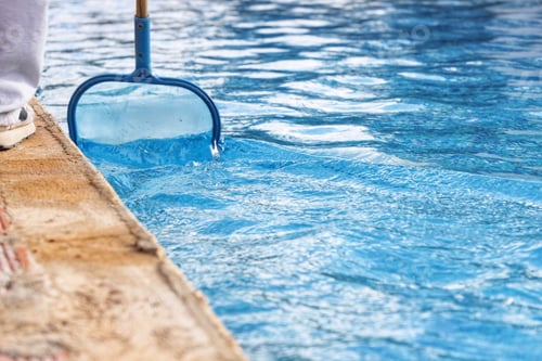 Preview: someone cleaning the side of a pool with a plunger
