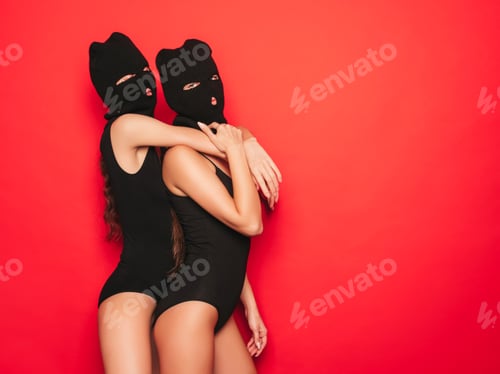 Preview: Portrait of two hot women posing in studio