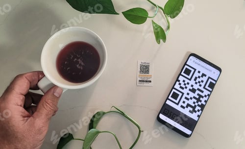 Preview: Overhead flat lay of modern technology using quick response code.