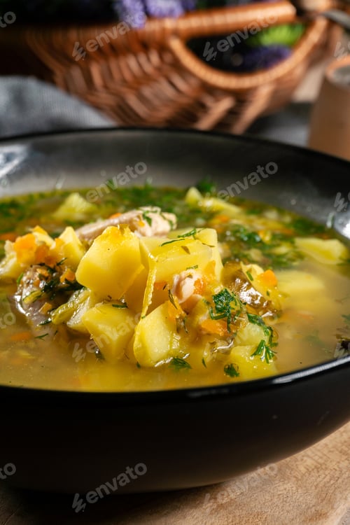 Preview: Cucumber soup in dark bowl.