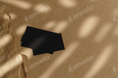 Preview: Black business cards on cork board table