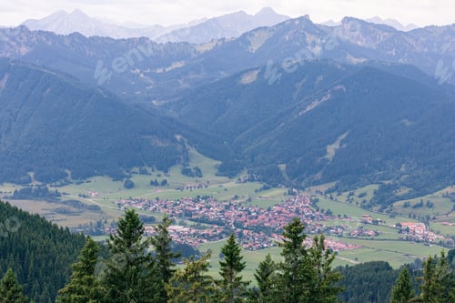 Preview: view from the mountain to the village at the foot and the ski lift