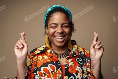 Preview: Young black woman in headband laughing and gesturing