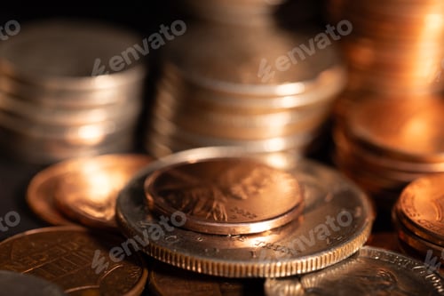 Preview: A stack of dollar coins stacked on each other in different positions. Money