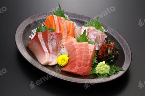 Preview: assorted sashimi; tuna(medium fatty), salmon, yellowtail, and sea bream. authentic Japanese dining.