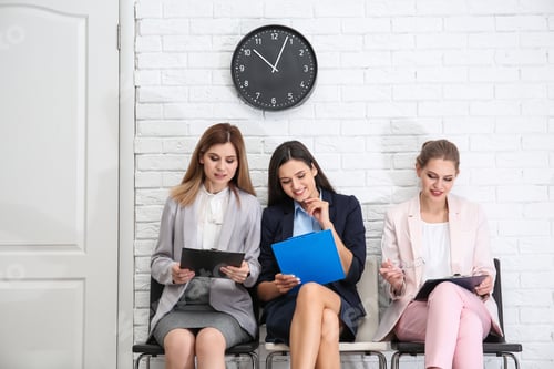 Preview: Young women waiting for job interview, indoors