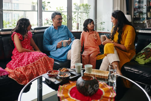 Preview: Indian Family Sitting At Home
