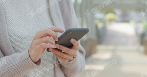 Preview: Woman use of cellphone