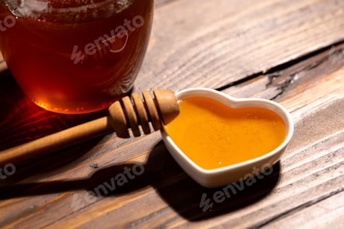 Preview: Jar of Honey with Heart-Shaped Dish on Wood