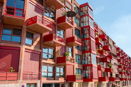 Preview: New red apartment building with balconies