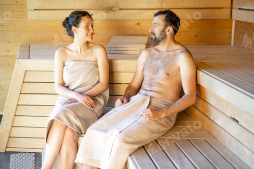 Preview: Couple resting in a sauna