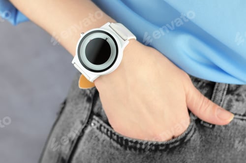 Preview: Beautiful white wrist watch on a female hand