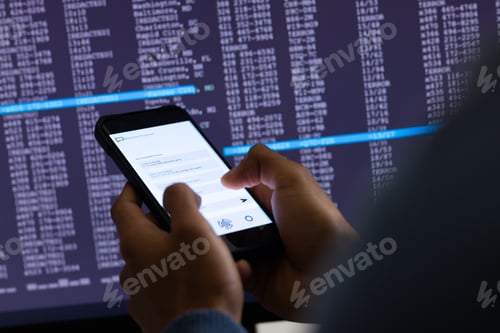 Preview: Biracial businessman using smartphone and data processing on grey background