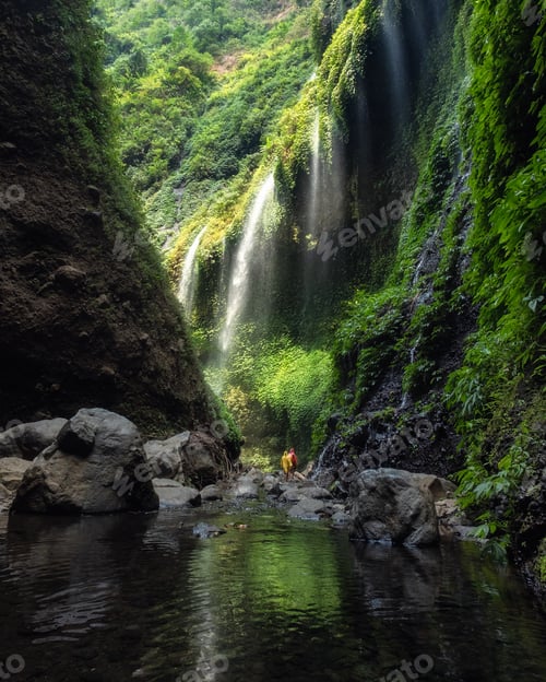 Preview: Majestic Madakaripura waterfall flowing in valley