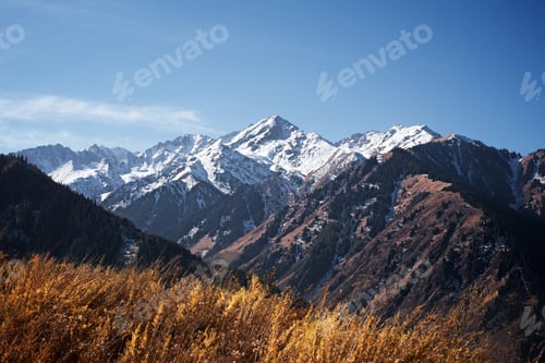 Preview: Snow on tops of the autumn mountains