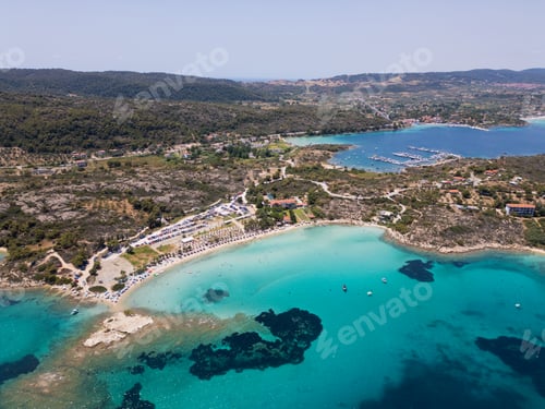 Preview: Aerial view of an island on Sithonia Peninsula, Greece, with beaches and rocks, surrounded by