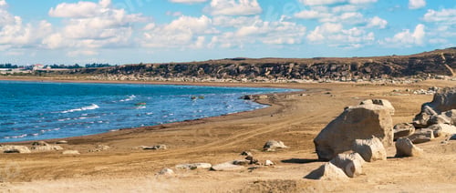 Preview: Panoramic view of empty sandy beach and blue sea