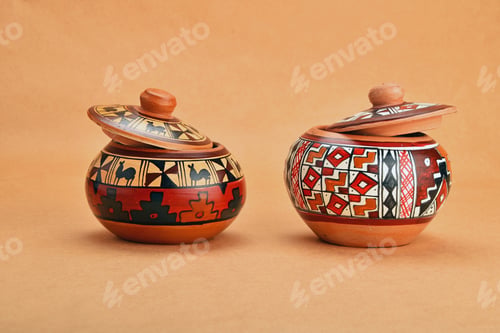 Preview: Two painted handmade ceramic pot with lids on kraft paper