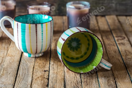 Preview: The striped Cup on wooden background