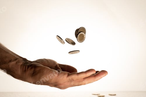 Preview: Flying money coins in the man's hand
