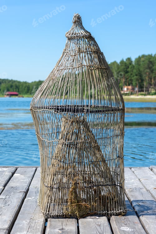 Preview: Fish trap on a wooden pier on the lake shore