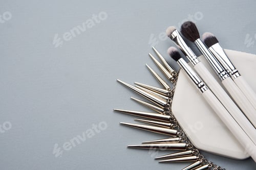 Preview: makeup brushes on gray background and stand cropped view Copy Space