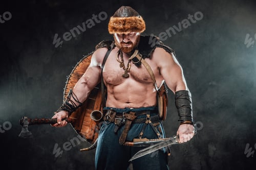 Preview: Sad and shirtless scandinaivan warrior in foggy background