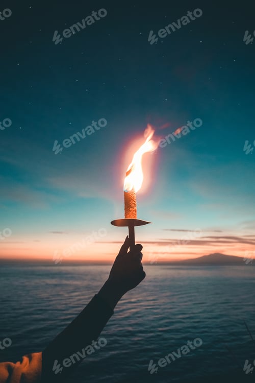Preview: Girl holds a torch in her hand