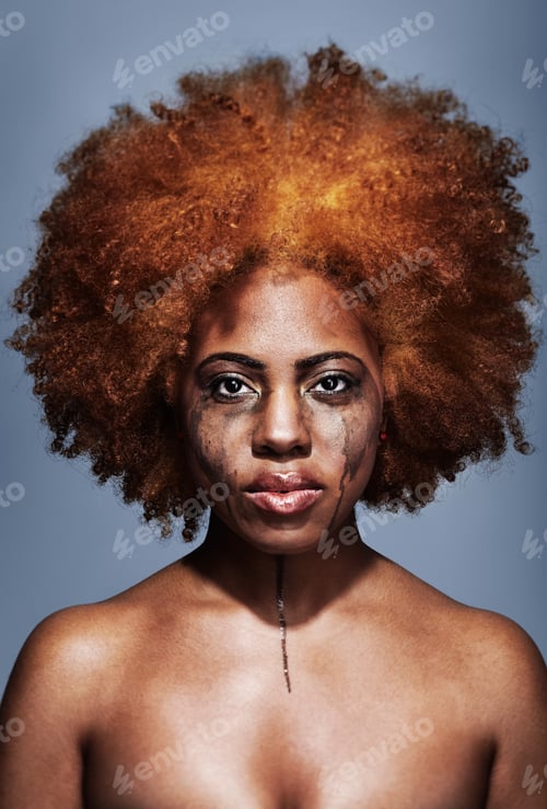 Preview: Portrait of a crying woman with make up running down her face