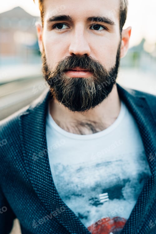 Preview: Young bearded man outdoor