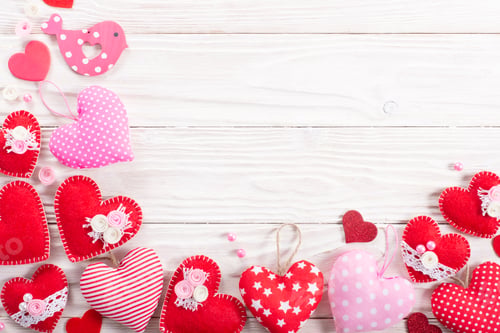 Preview: Valentine handmade heart flat lay background on white wooden table
