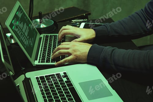 Preview: Close up of programmer of hacker hands typing a code