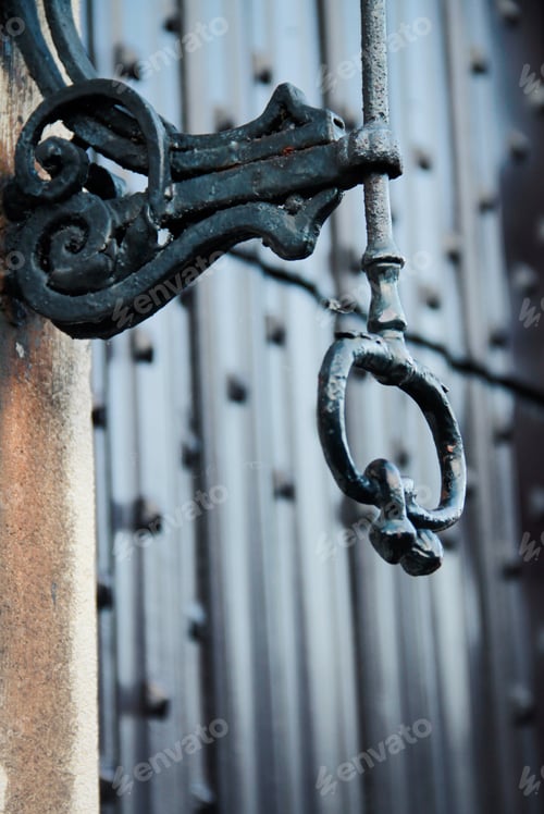Preview: Ornate Iron Work Detail on Aged Doorway