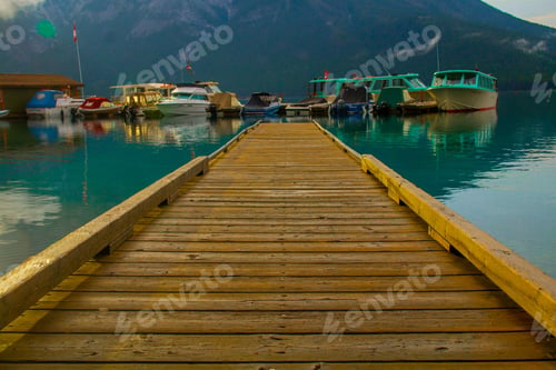 Preview: there is a wooden dock at the end of the water