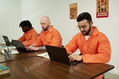 Preview: Young Adult Men of Diverse Ethnicities Using Laptops While Studying Together