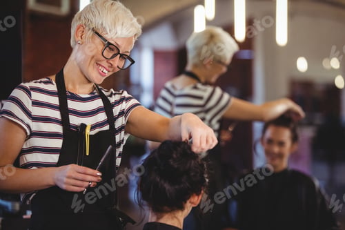 Preview: Female getting her hair trimmed