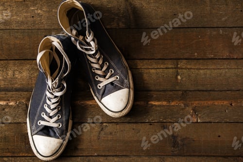 Preview: Gumshoes on wooden background
