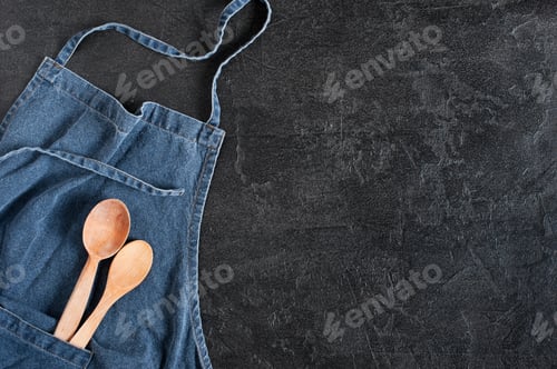 Preview: Denim Apron on the Black Textured Table, Background