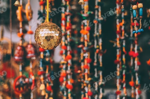 Preview: close-up view of colorful decorations hanging at Rajasthan, Pushkar