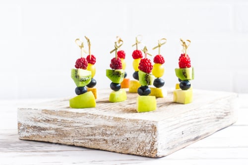 Preview: Colorful Fruit Skewers on Rustic Wood Block