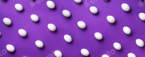 Preview: Food concept with white chicken eggs on violet background. Top view. Creative pattern in minimal