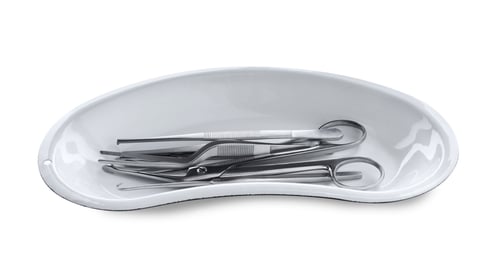 Preview: Surgical instruments in kidney dish on white background