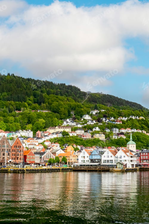 Preview: Beautiful coastal houses with lively colors and calm reflection in Bergen, Norway