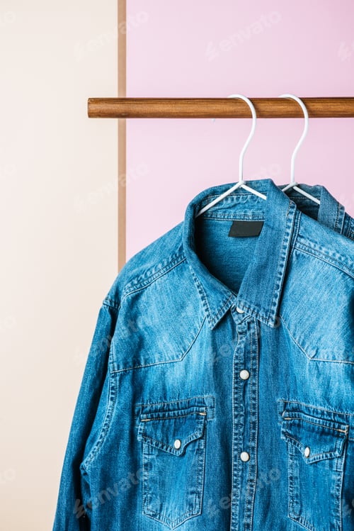 Preview: casual denim shirts on hangers, fashion industry